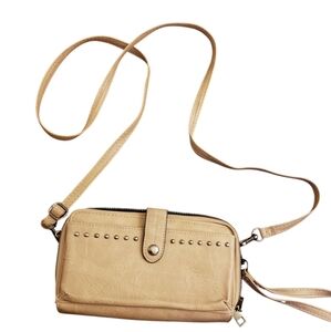 Beige wristlet with crossbody strap
